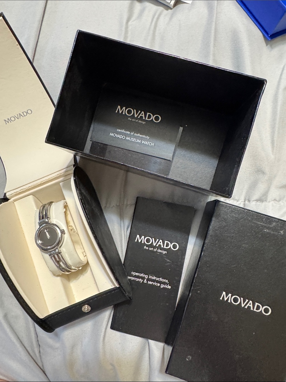 Movado Ladies Watch with silver Dial and Silver Band